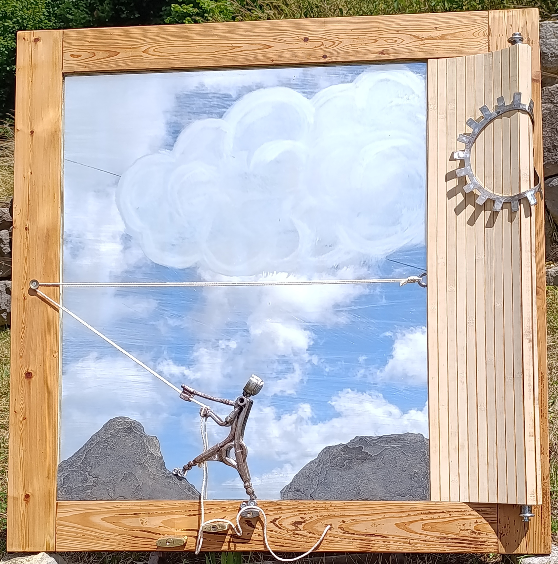 Tableau relief en verre, acier et bois sur les émotions masquées.